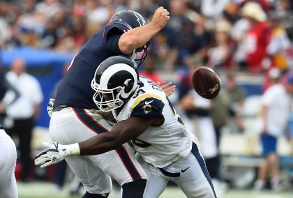 The Rams’ Samson Ebukam #50 hits Texans quarterback Tom Savage #3 causing him to fumble during their game at the Los Angeles Memorial Coliseum Sunday, November 12, 2017. The Rams defeated the Texans 33-7. (Photo by Hans Gutknecht, Los Angeles Daily News/SCNG)